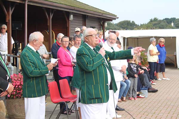 Photo of board members making speech at Lawn Bowls Tournament 2017
