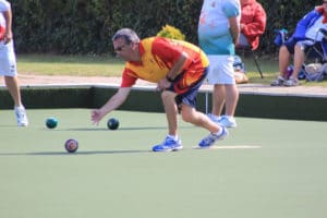 Image of International bowlers playing in Lawn Bowls tournament